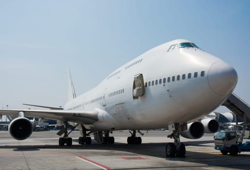 Airplane near the terminal in an airport cockpit