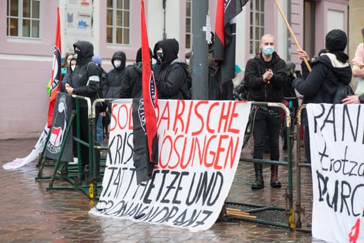 Demonstration in Trier on the 20.01.2021 against the covid-19 regulations in Germany, protest of the Antifa and the radical left wing against corona deniers