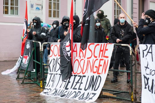 Demonstration in Trier on the 20.01.2021 against the covid-19 regulations in Germany, protest of the Antifa and the radical left wing against corona deniers