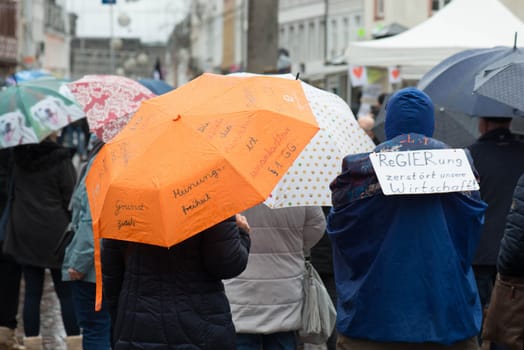 Demonstration in Trier on the 20.01.2021 against the covid-19 regulations in Germany, protest of the Antifa and the radical left wing against corona deniers