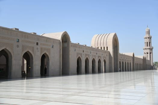The exterior of the building with the washrooms for men and women can be seen in the archway of the Riwaq in the Sultan Qaboos Grand Mosque in Makat,Oman.