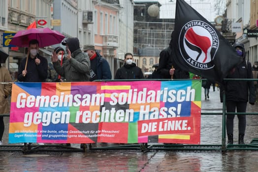 Demonstration in Trier on the 20.01.2021 against the covid-19 regulations in Germany, protest of the Antifa and the radical left wing against corona deniers