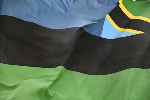 In the wind the national flag,banner of the island of Zanzibar after the union with Tanzania since January 10,2005. The blue represents the Indian Ocean.