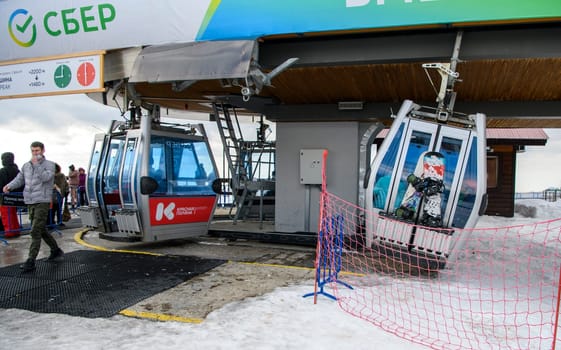 Sochi  Russia - January 02  2021: Skiers climb the cable car at the Krasnaya Polyana ski resort