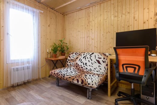 Interior of a small modest room of a country house