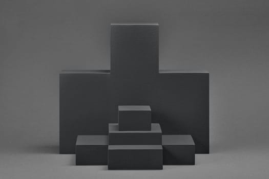 Set of rectangular parallelepipedes on a gray background. Abstract background with copy space and clipping path for design of advertising, engineering draft, web design.