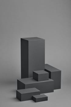 Set of rectangular parallelepipedes on a gray background. Abstract background with copy space and clipping path for design of advertising, engineering draft, web design.