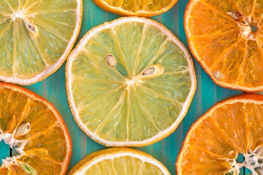 Citrus fruit background with sliced orange and lemon