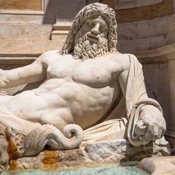 ROME, ITALY - CIRCA AUGUST 2020: famous Greek sculpture of Ocean god, named Marforio. Classic mythology in art.
