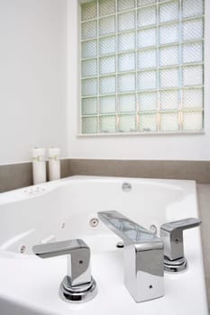 Close-up of a bathtub faucet