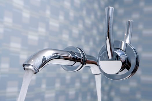 Close-up of a faucet in the bathroom