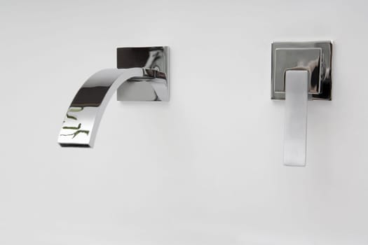 Close-up of a faucet in the bathroom