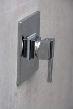 Close-up of a faucet in the bathroom