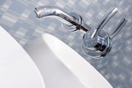 Close-up of a faucet in the bathroom