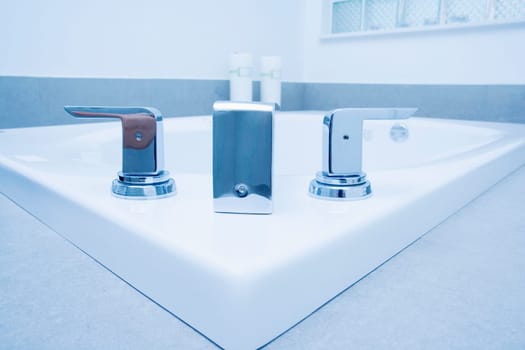 Close-up of a bathtub faucet