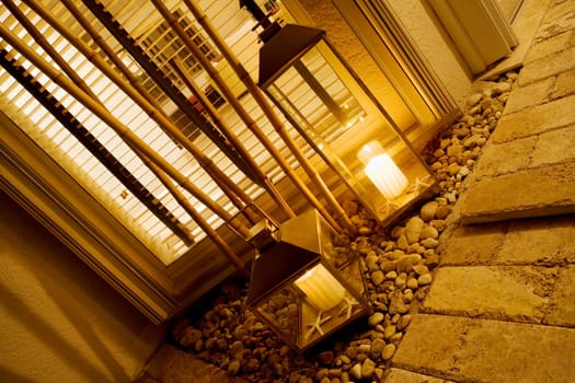 Close-up of two lanterns in a living room