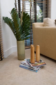 Candlestick holders on magazines