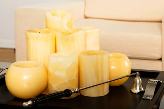 Candles in a tray on a coffee table