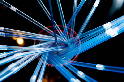 Close-up of drinking straws in a sink