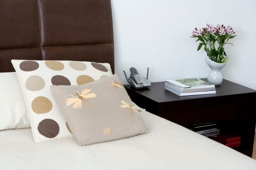 Bed and a side table in a bedroom