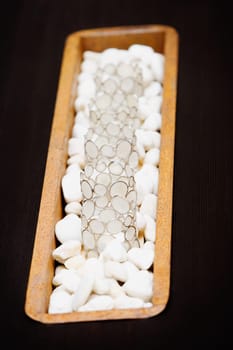 Close_up of decorative glasses on pebbles