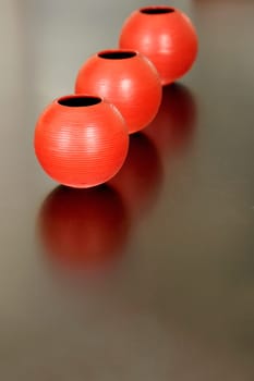 Close_up of three ceramic pots on a table