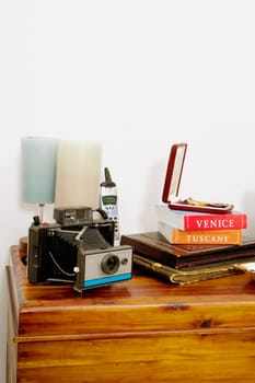 Camera with a lamp on a table