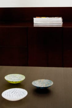 Three ceramic bowls on a table