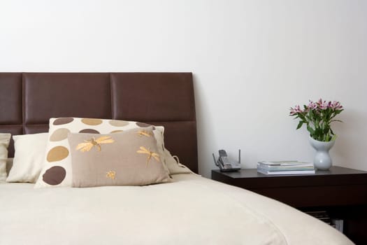 Bed and a side table in a bedroom