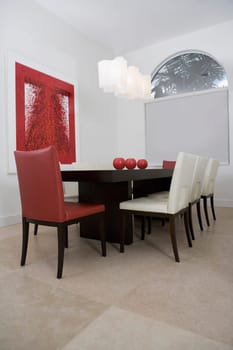 Decorative urns on a dining table in a dining room