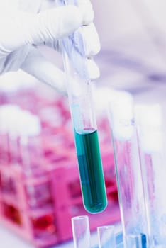 Close-up of a personŽs hand holding a test tube