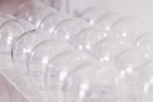Close-up of flasks on a rack