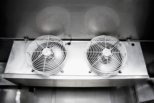Low angle view of two exhaust fans in a laboratory