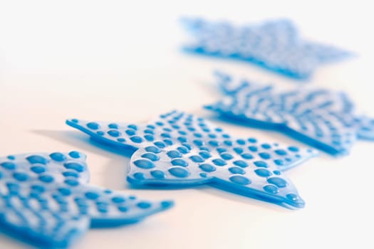 Close-up of four blue stars