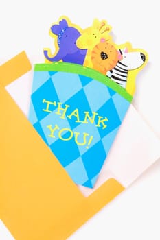 Close-up of a greeting card with an envelope