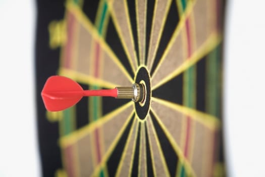 Dart in the bullŽs-eye of a dartboard