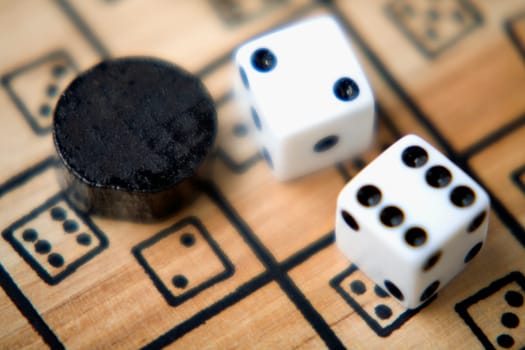 High angle view of a pair of dice on a game board