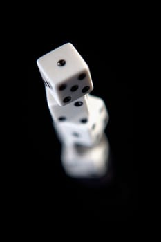 Close-up of four dice one on top of the other