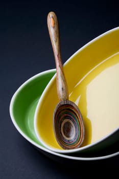 Close-up of a spoon with two trays