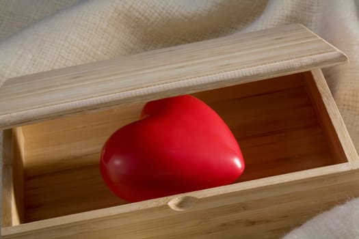 Close-up of a heart in a wooden box