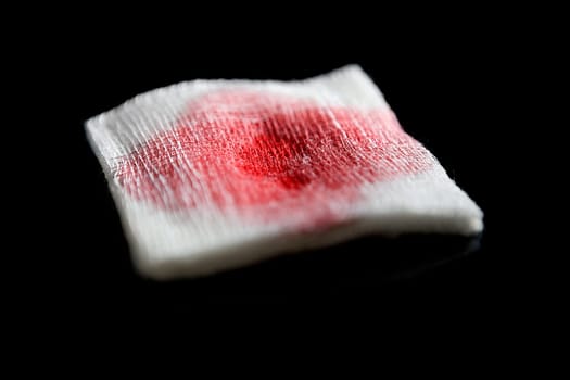 Close-up of a gauze with blood