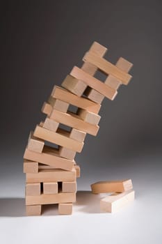 Close-up of a stack of falling wooden blocks