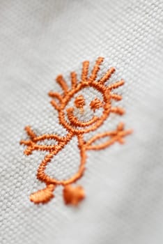Close-up of an embroidery on fabric