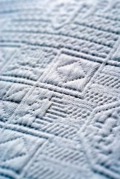 Close-up of an embossed design on fabric