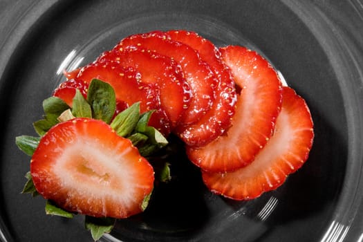 High angle view of sliced strawberries in a bowl