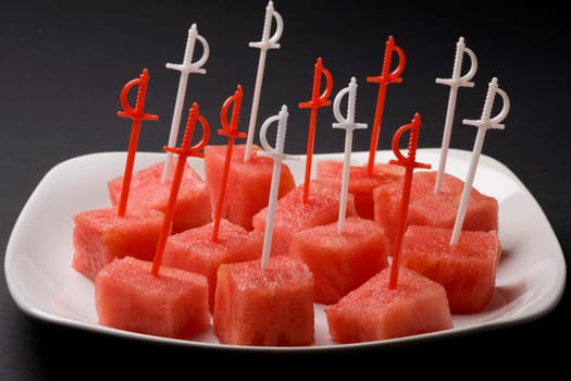 Close-up of the pieces of watermelon on a tray