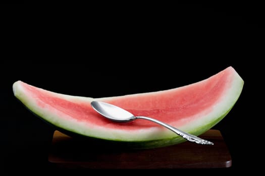 Close-up of a spoon on water melon