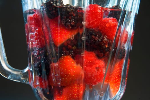 Close-up of berries in a jug