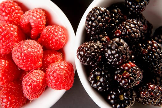 High angle view of berries in two bowls