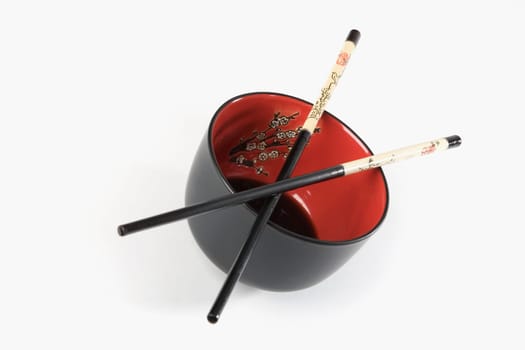 Close-up of chopsticks on a bowl